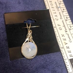 Rainbow Moonstone Round in Sterling